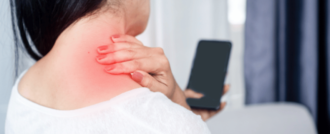 woman suffering from neck , shoulder pain using mobile phone too long with bad posture (1)